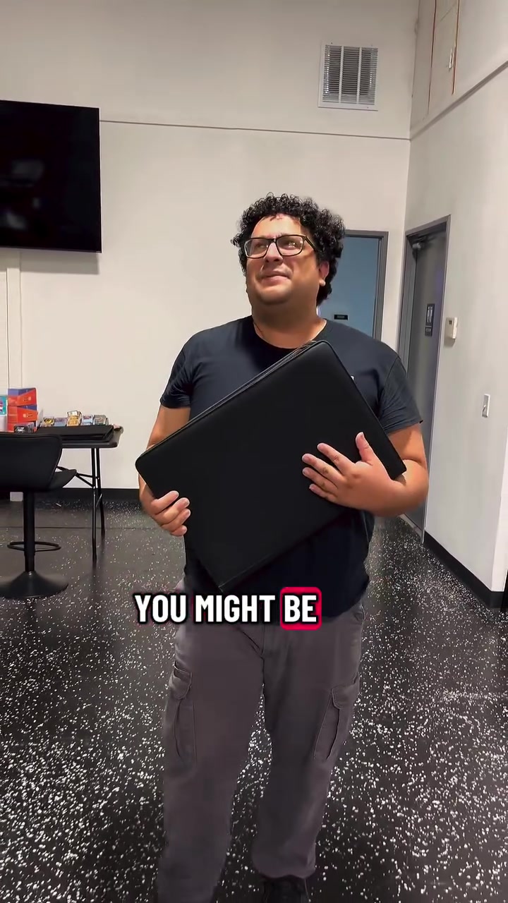 A Rawmon team member at the Play Center inviting players to a Riftbound game night